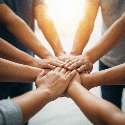 Diverse hands holding each other in a circle, symbolizing global unity and collective action in prayer, soft focus, bright, hopeful lighting, no text, no words, no typography, 8K
